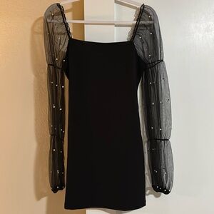 black dress with sheer pearl sleeves
